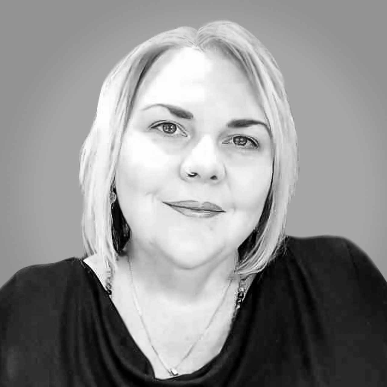 Image of Danielle's black and white headshot Image of Danielle's black and white headshot